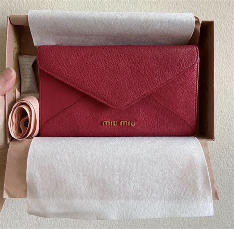 miu miu madras long flap wallet|Miu Miu Madras Fiocco Long Flap Wallet – LuxUness.